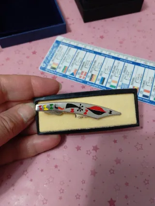 Fermacravatta vintage design colorato