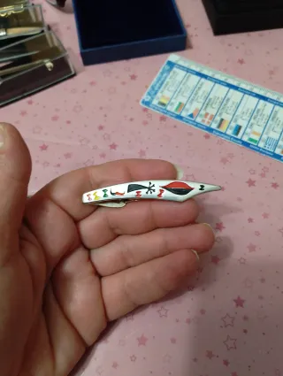 Fermacravatta vintage design colorato