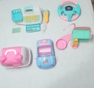 Giochi per bambina: cassa, auto, volante con suoni