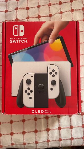 Nintendo Switch OLED con scatola e accessori
