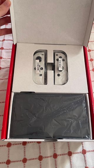 Nintendo Switch OLED con scatola e accessori