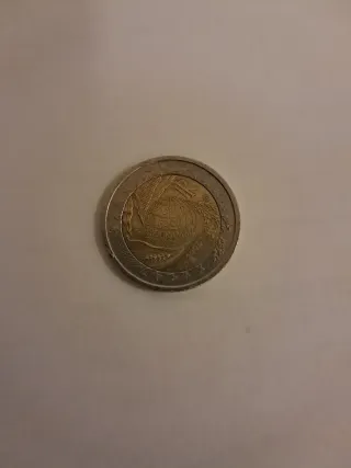 Colección de 6 monedas internacionales valiosas.