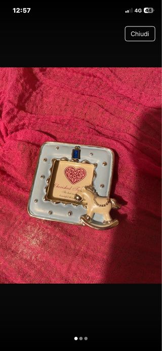 Cornice portafoto bimbo cavallino a dondolo