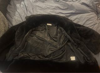 Coralise pelliccia sintetica nera