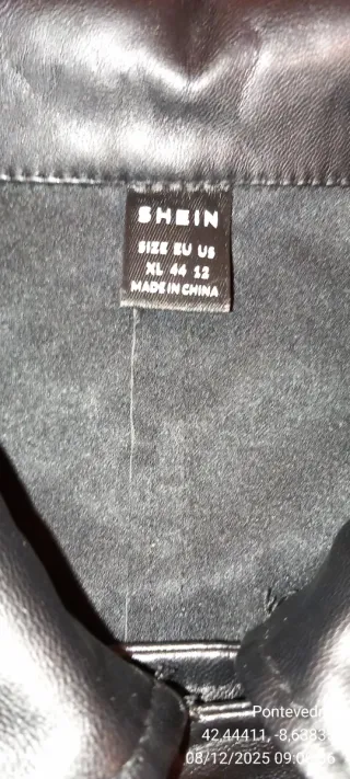 Chaqueta y falda de piel negra