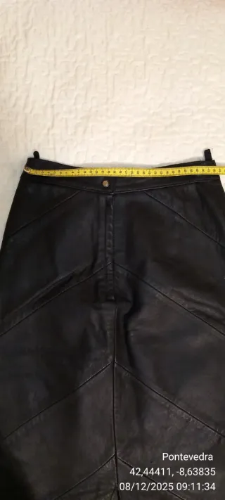 Chaqueta y falda de piel negra