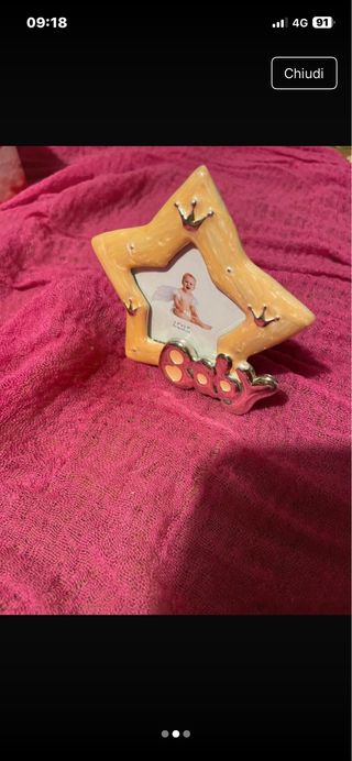 Cornice a forma di stella per neonato