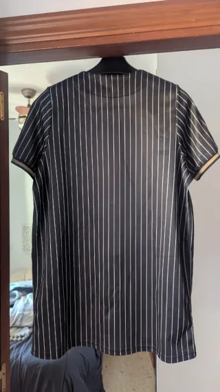 Camiseta SikSilk rayas doradas