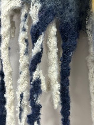 Bufanda a cuadros con flecos