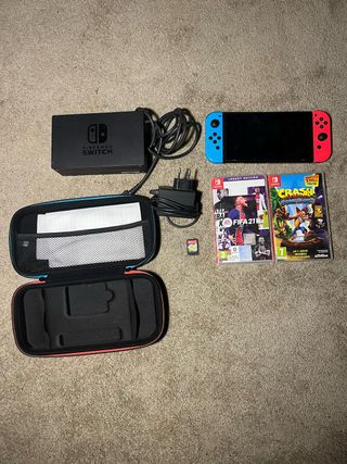 Nintendo Switch + 3 giochi e custodia