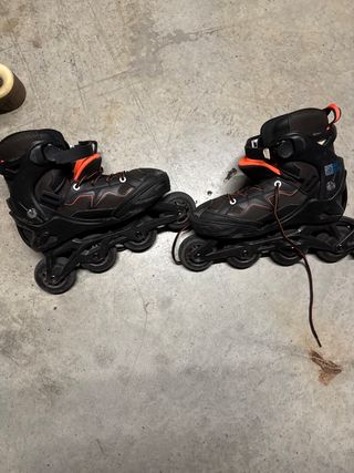Patines en línea negros y naranjas 35-38