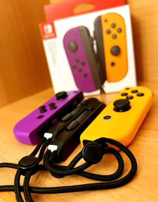 Joy-Con Nintendo Switch Viola e Arancione