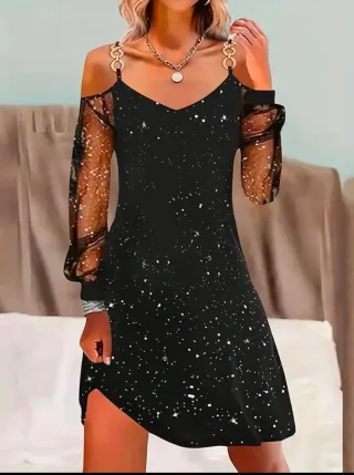 Vestido negro con detalles plateados