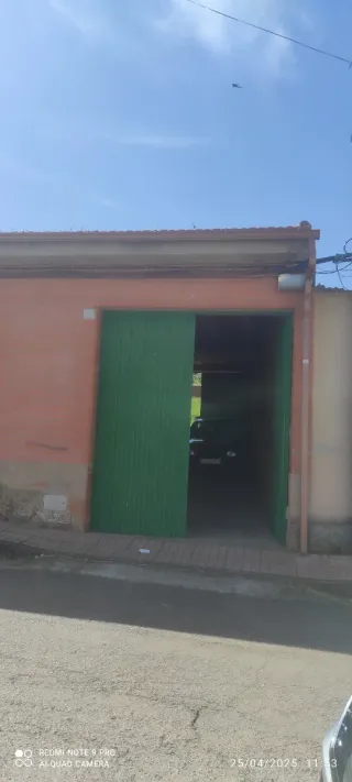 Parcera con almacén y garaje