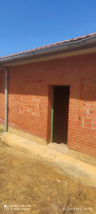 Parcera con almacén y garaje