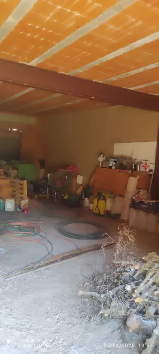 Parcera con almacén y garaje