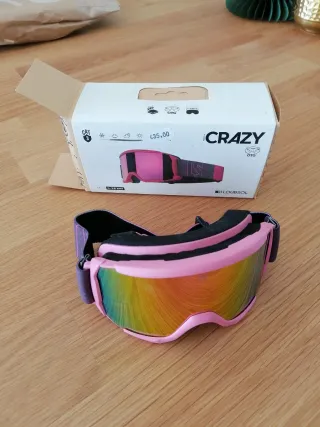 Gafas de esquí rosas y arcoíris, niña