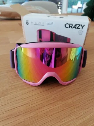 Gafas de esquí rosas y arcoíris, niña