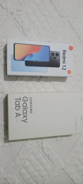 Scatole e manuali originali per Redmi 12 e Samsung Tab A
