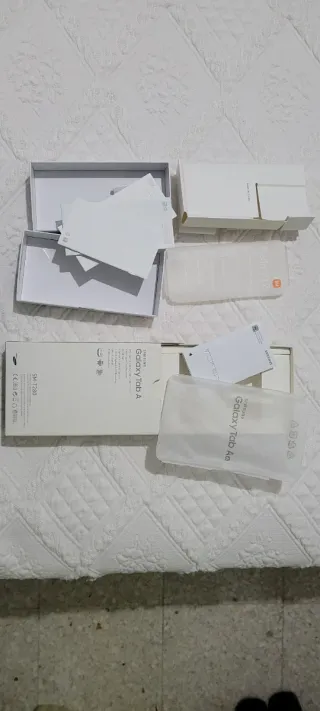 Scatole e manuali originali per Redmi 12 e Samsung Tab A