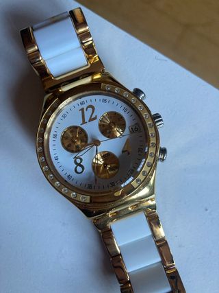 Reloj Swatch Oro y Blanco Mujer