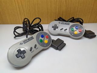 Pacchetto 2 controller Super Nintendo SNSP-005 PAL (LEED)