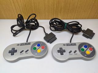 Pacchetto 2 controller Super Nintendo SNSP-005 PAL (LEED)