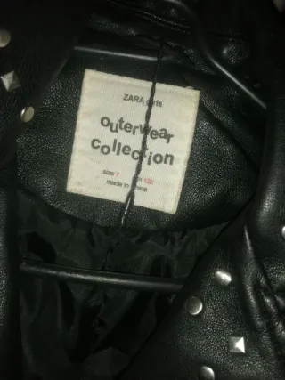 Chaqueta cuero niña tachuelas flecos