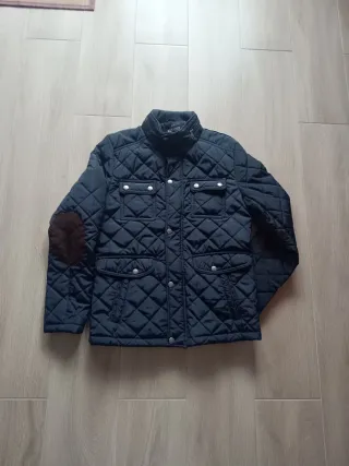 Parka acolchada ,azul marino con coderas.