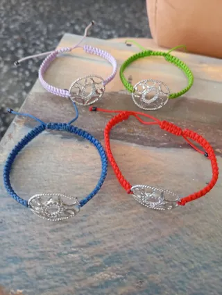 Lote 4 pulseras con dije