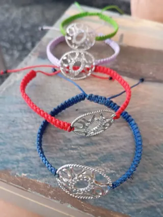 Lote 4 pulseras con dije