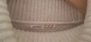 Jersey cuello alto beige claro