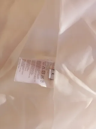 Plumas blancas acolchadas mujer