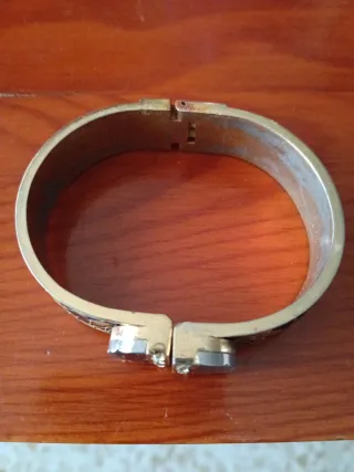 Pulsera pitón y brillantes dorada