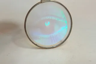 CIONDOLO con OLOGRAMMA OCCHIO DORATO