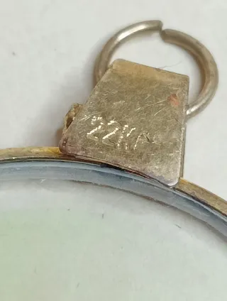 CIONDOLO con OLOGRAMMA OCCHIO DORATO