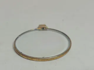 CIONDOLO con OLOGRAMMA OCCHIO DORATO