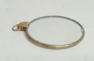 CIONDOLO con OLOGRAMMA OCCHIO DORATO