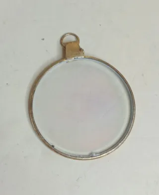 CIONDOLO con OLOGRAMMA OCCHIO DORATO