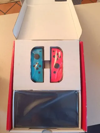 Nintendo Switch OLED, controller e cuffie