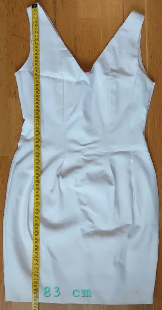 Vestido blanco corto ajustado.Ver fotos para talla