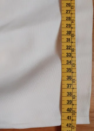 Vestido blanco corto ajustado.Ver fotos para talla