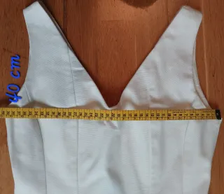 Vestido blanco corto ajustado.Ver fotos para talla