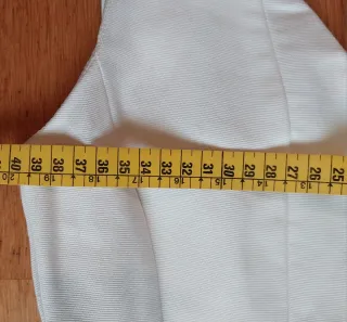 Vestido blanco corto ajustado.Ver fotos para talla