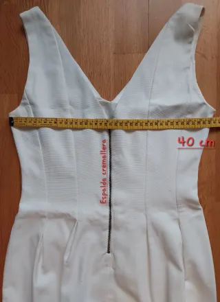 Vestido blanco corto ajustado.Ver fotos para talla