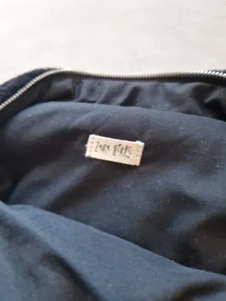 Mochila negra peluche con dibujos