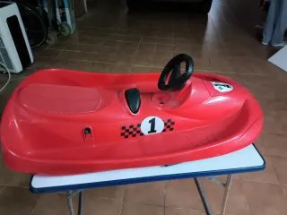 Trineo rojo con volante y dorsal 1