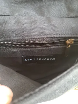 Bolso de fiesta negro y dorado pedrería