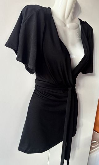 Elegante Blusa cruzada con cinturón