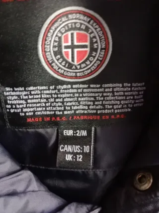 Plumas Geographical Norway azul de niña